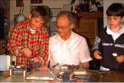 PETER WITH TWO OF HIS STUDENTS